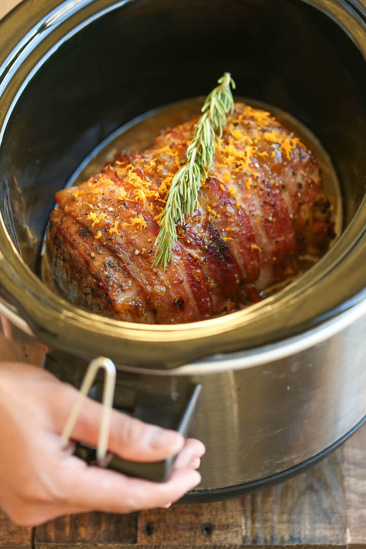 Slow Cooker Bacon Wrapped Pork Loin - Because bacon makes everything better, especially when it's effortlessly slow cooked with a brown sugar glaze!