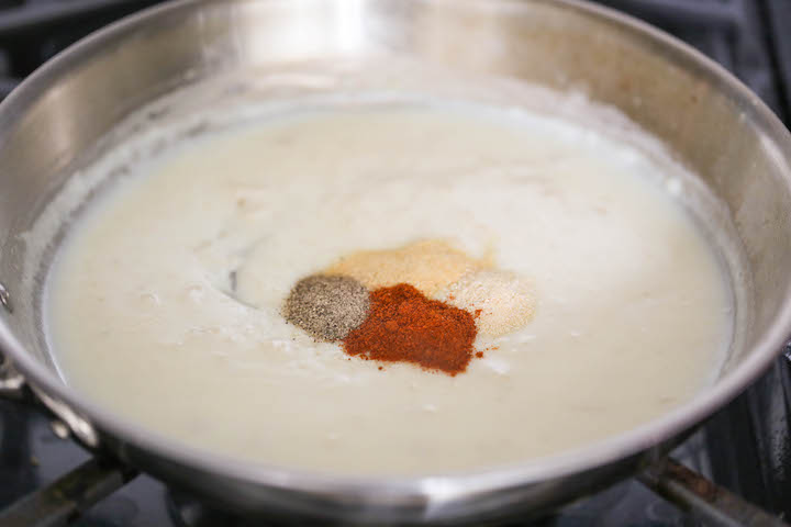 10 Minute Nacho Cheese - Super easy and completely made from scratch (no Velveeta)! It's cheesy, sharp, smoky, unbelievably velvety and just SO GOOD!