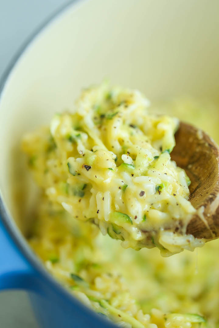 Cheesy Garlic Zucchini Rice - Made in ONE POT! So easy. So cheesy. So garlicky. A side dish for all of your meals! Can be made with brown rice or quinoa.
