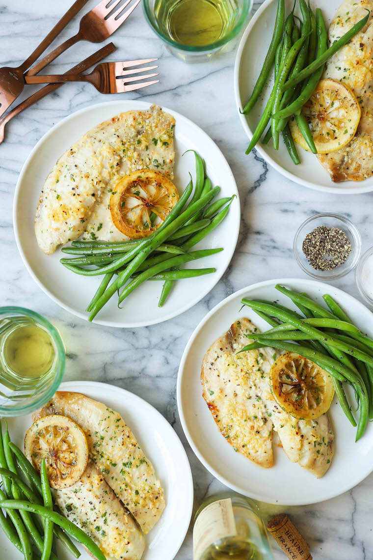 Baked Lemon Butter Tilapia - The easiest, most effortless 20 min meal ever from start to finish. And it's all made in a single pan. Win-win situation here.