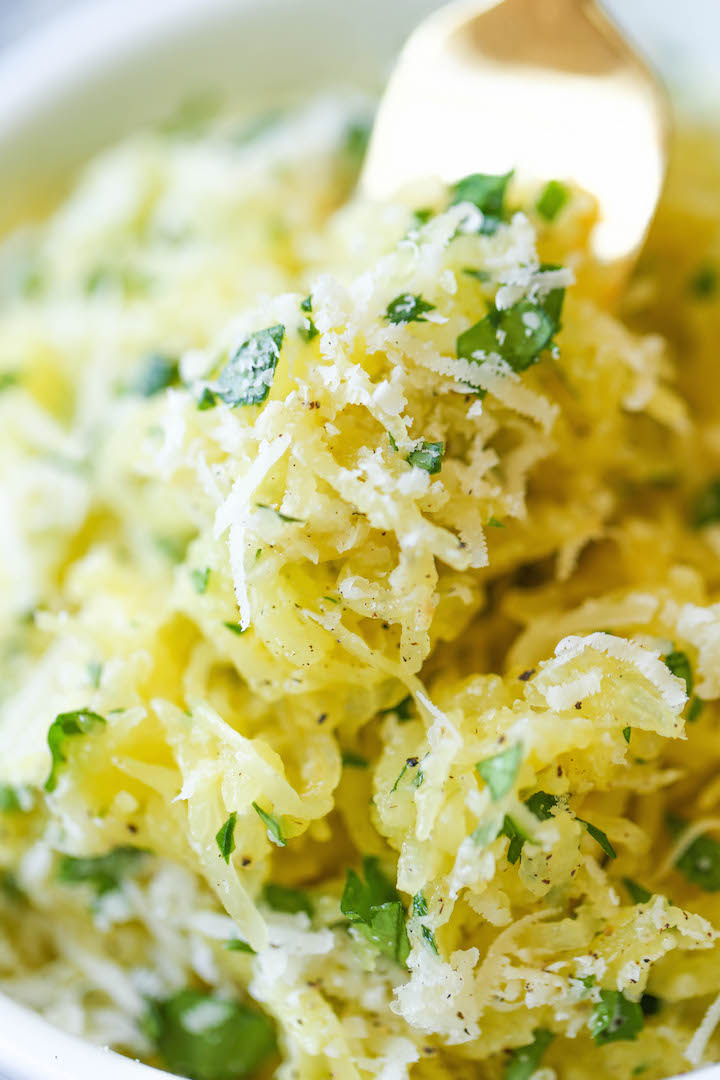 Garlic Parmesan Spaghetti Squash - Roasted spaghetti squash tossed in butter, garlic and plenty of fresh Parmesan cheese. It's simple, healthy and low-carb! 410 calories.