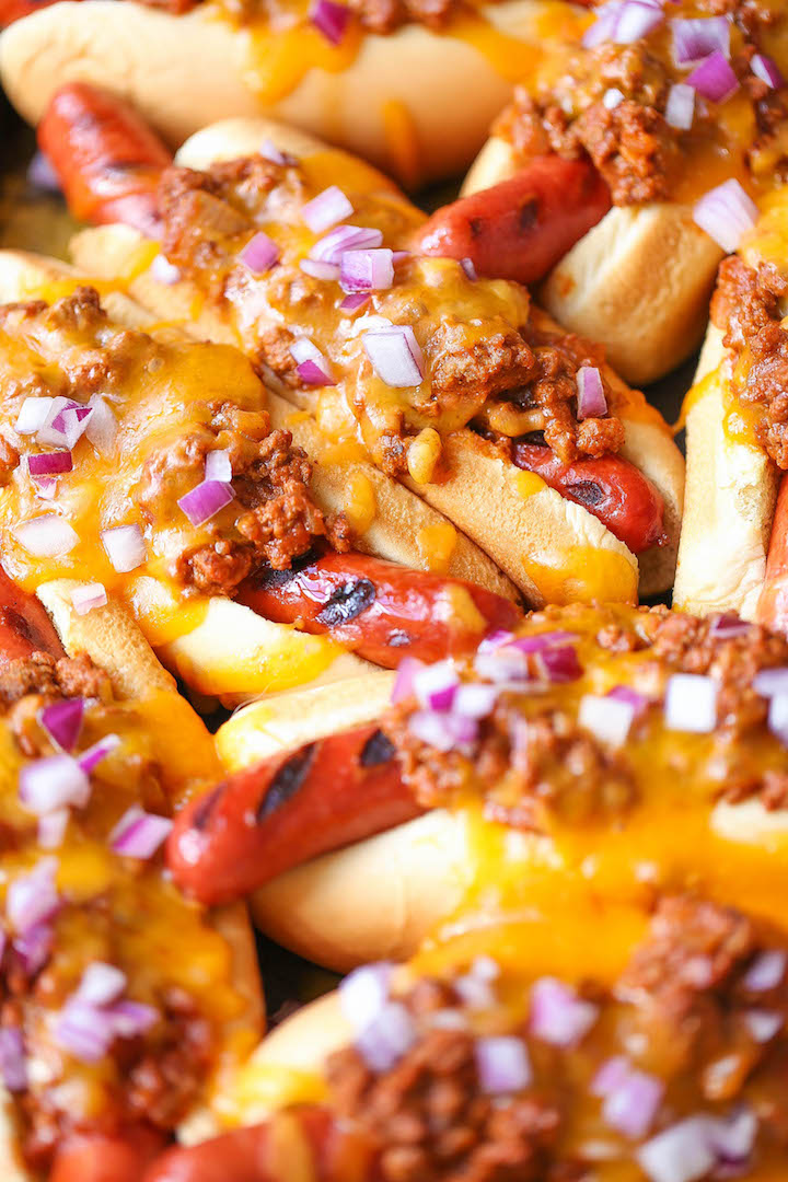 Baked Chili Cheese Dogs - A guaranteed crowd favorite. Promise! So easy to make and you can bake it right in the oven for that melted cheesy goodness! YES!