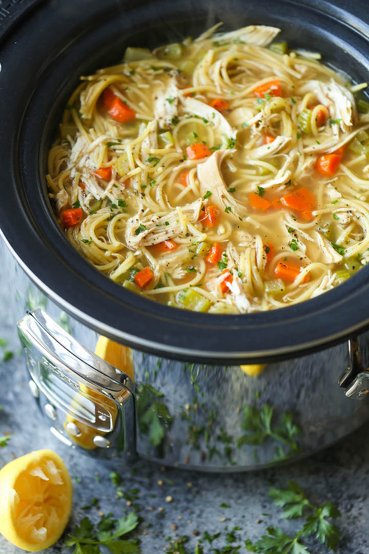Slow Cooker Chicken Noodle Soup - So hearty, comforting and soothing (and so easy!). Perfect during the cold weather or fighting off a cold!