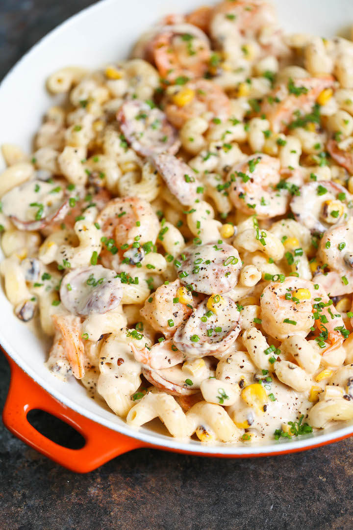 Shrimp Pasta with Tomato Basil Cream Sauce - Unbelievably CREAMY and just melt-in-your-mouth AMAZING!!! Loaded with sun dried tomatoes, spinach and basil.