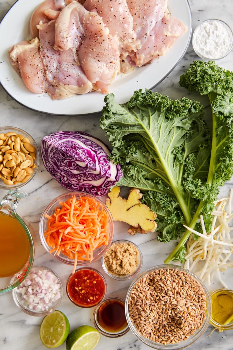 Thai Chicken Buddha Bowls - Packed with whole grains, fresh veggies, and a crave-worthy peanut sauce — so healthy, hearty and full of flavor!