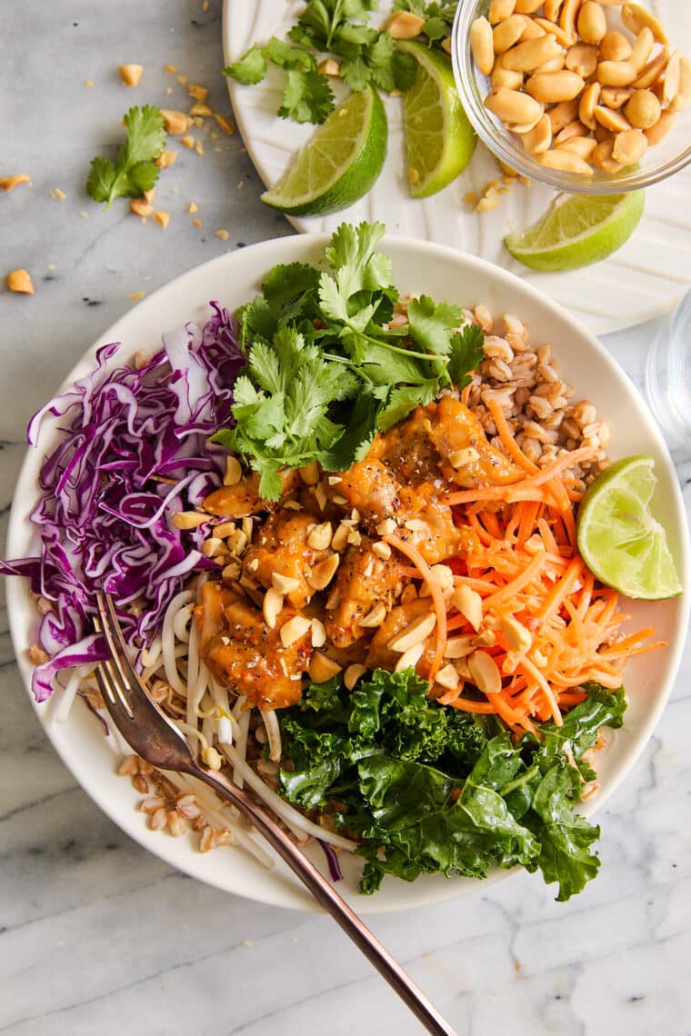 Thai Chicken Buddha Bowls - Packed with whole grains, fresh veggies, and a crave-worthy peanut sauce — so healthy, hearty and full of flavor!