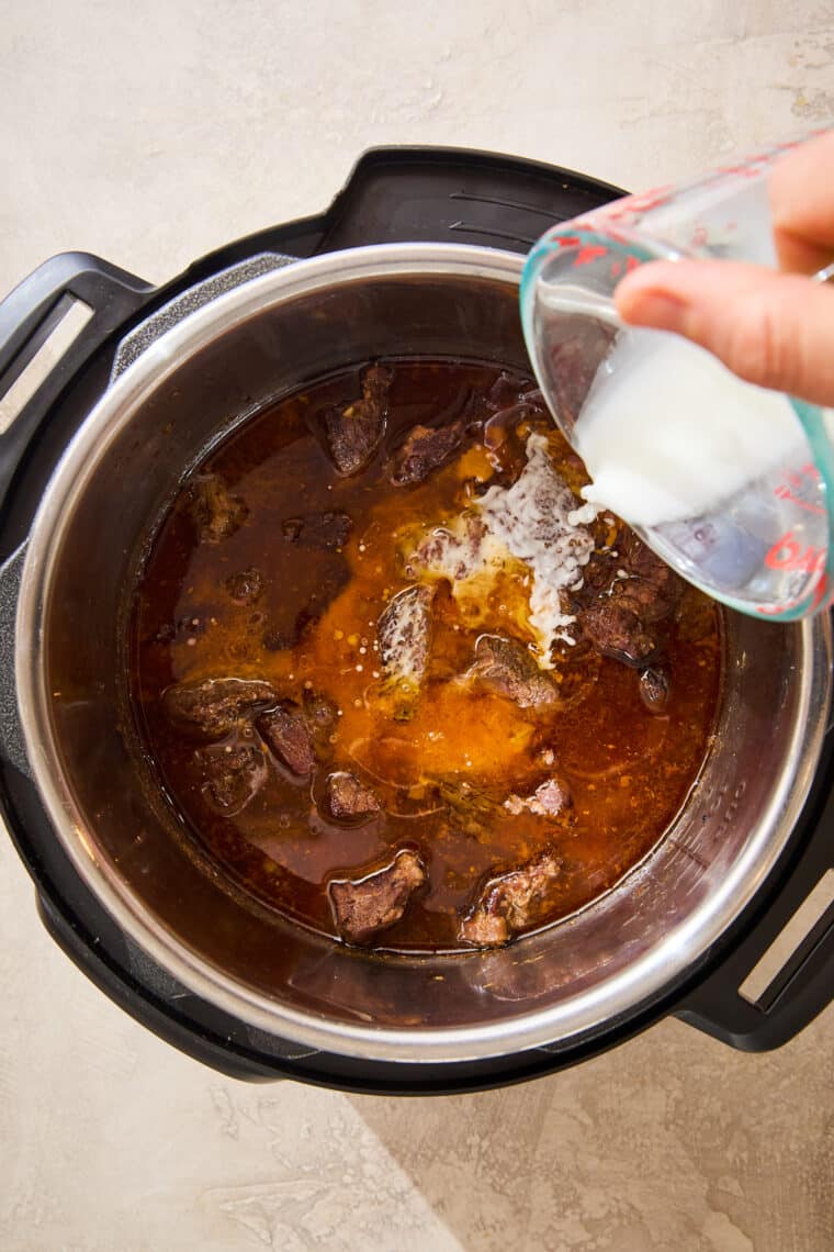 Instant Pot Korean Beef - The BEST and easiest Korean beef with 10 min prep or less! And the meat comes out amazingly juicy, flavorful and melt-in-your-mouth tender!