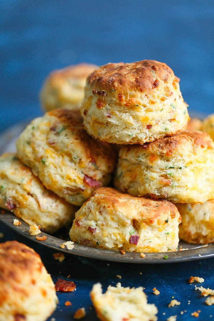 Bacon Cheddar Chive Biscuits - The BEST cheddar biscuit recipe ever! Loaded with crispy bacon bits, extra-sharp cheddar cheese and chives.