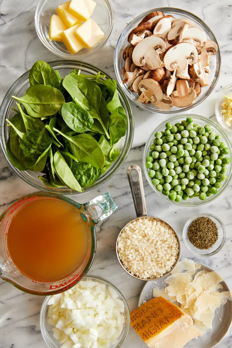 Instant Pot Mushroom Risotto - Truly the EASIEST no-fuss risotto! Amazingly rich + creamy, loaded with mushrooms, spinach, peas and Parmesan!