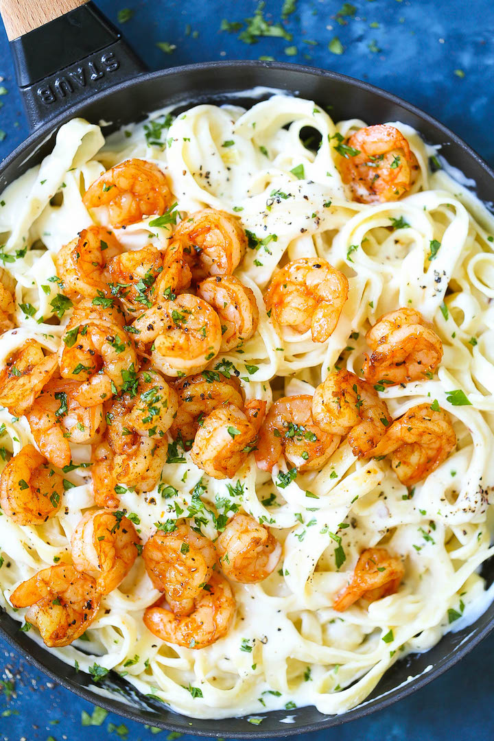 Shrimp Alfredo Fettuccine - Easy peasy weeknight alfredo made completely from scratch, made in 35 min or less! With the creamiest alfredo sauce ever with perfectly flavored, tender shrimp! This is comfort food at its best (and easiest!).
