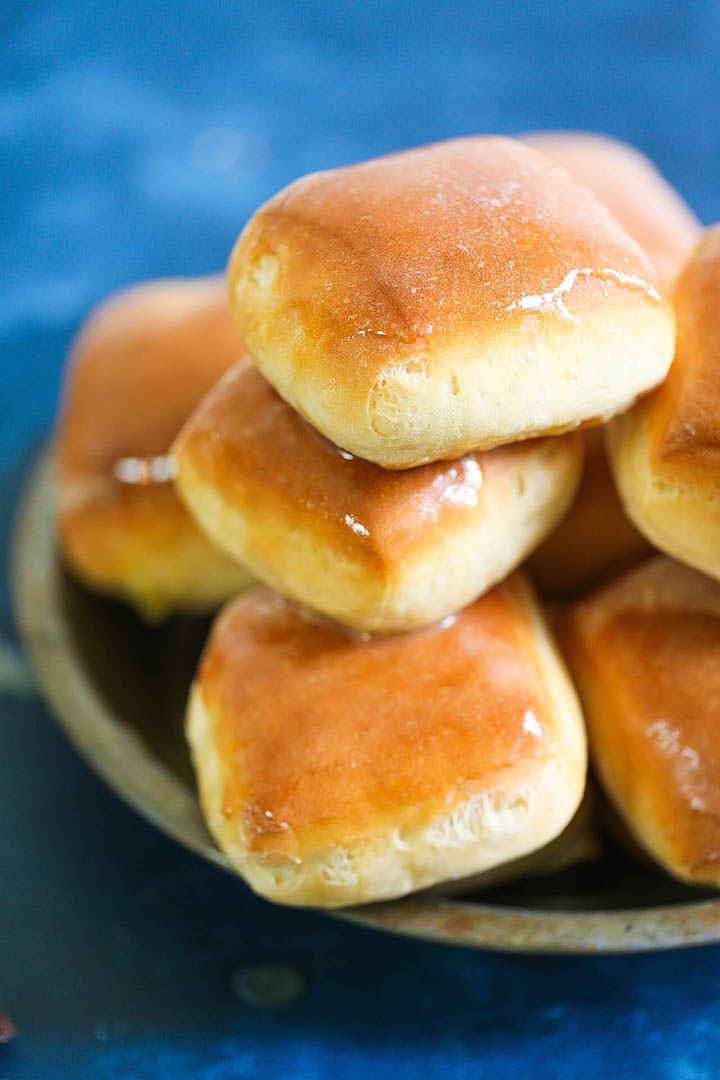 Texas Roadhouse Rolls - Everyone's FAVORITE copycat Texas roadhouse rolls! Yes, you can make them right at home completely from scratch and it is SO MUCH BETTER! It's so amazingly buttery and fluffy! You will only want the homemade version after this!