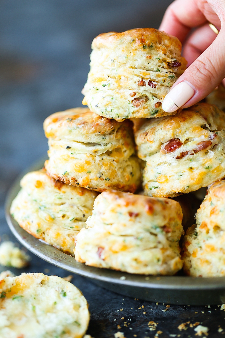 Black Pepper Cheddar Bacon Biscuits - So flaky, fluffy and buttery! With crisp bacon bits, sharp cheddar, black pepper + garlic. These are simply THE BEST!