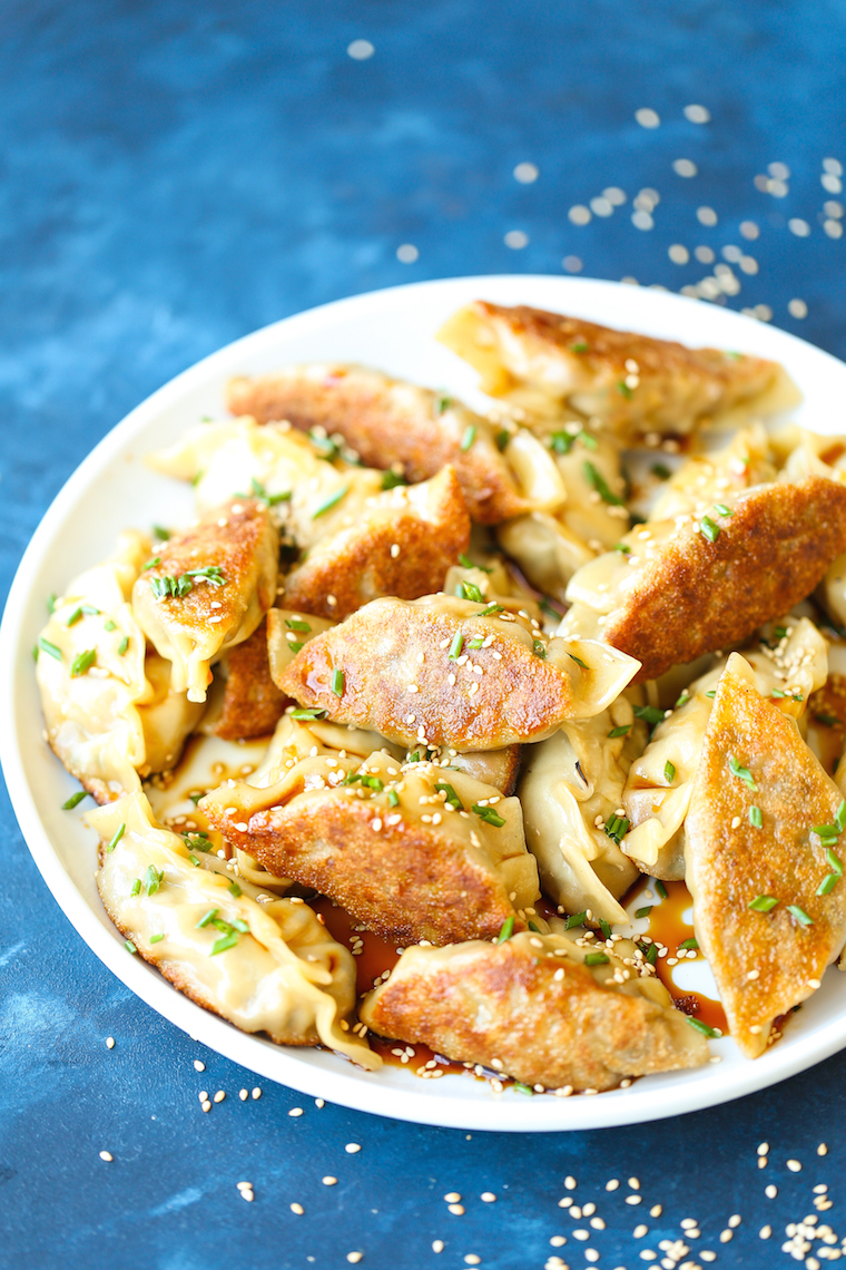 Pork Potstickers - Better-than-takeout potstickers you can make right at home! With a tender, flavorful pork filling with garlic, ginger and green onions!