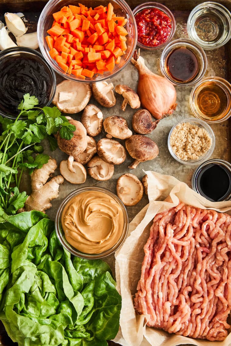Peanut Chicken Lettuce Wraps - A super quick dinner made in 25 min! It's so hearty, filling, and low-carb, yet the family will still be begging for more!