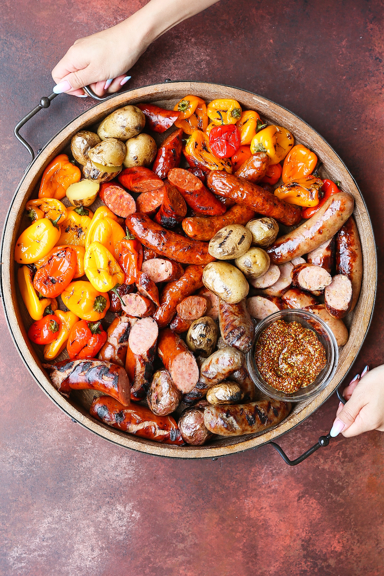 Grilled Sausages, Peppers and Potatoes - The most amazing grilled sausage platter for your next potluck or BBQ! This is easy to prepare and so impressive!