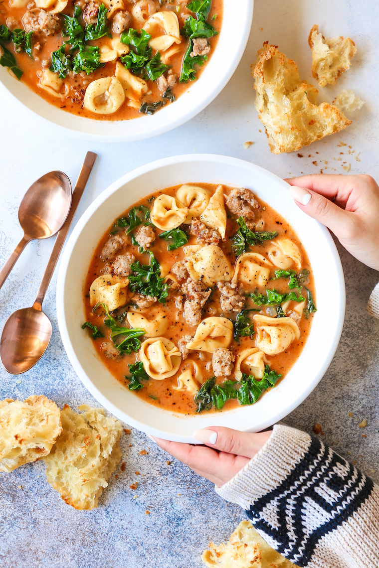 Creamy Tortellini Soup - A quick 30 min dinner! Made with crumbled sausage, kale, Parmesan and tender tortellini. So easy, so cozy, so good.