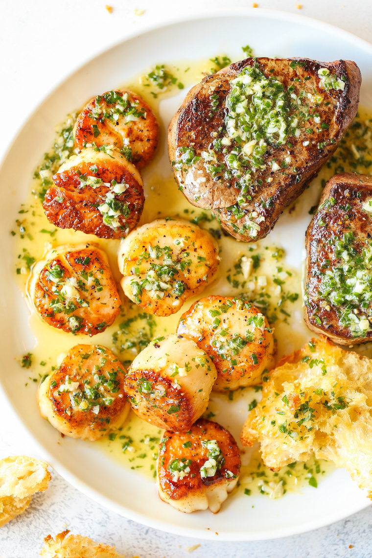 Garlic Butter Steak and Scallops - SURF AND TURF made in less than 30 minute! The steak and scallops are perfectly cooked with the dreamiest garlic butter sauce. Yes, please!