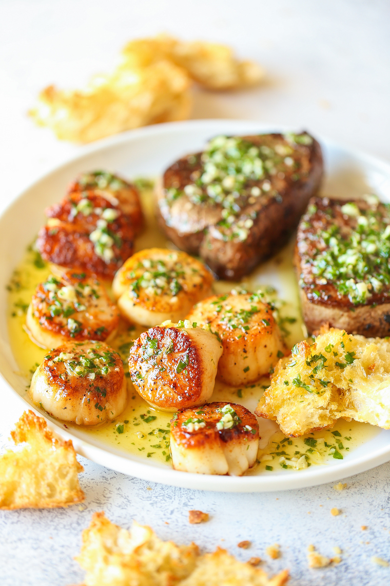 Garlic Butter Steak and Scallops - SURF AND TURF made in less than 30 minute! The steak and scallops are perfectly cooked with the dreamiest garlic butter sauce. Yes, please!
