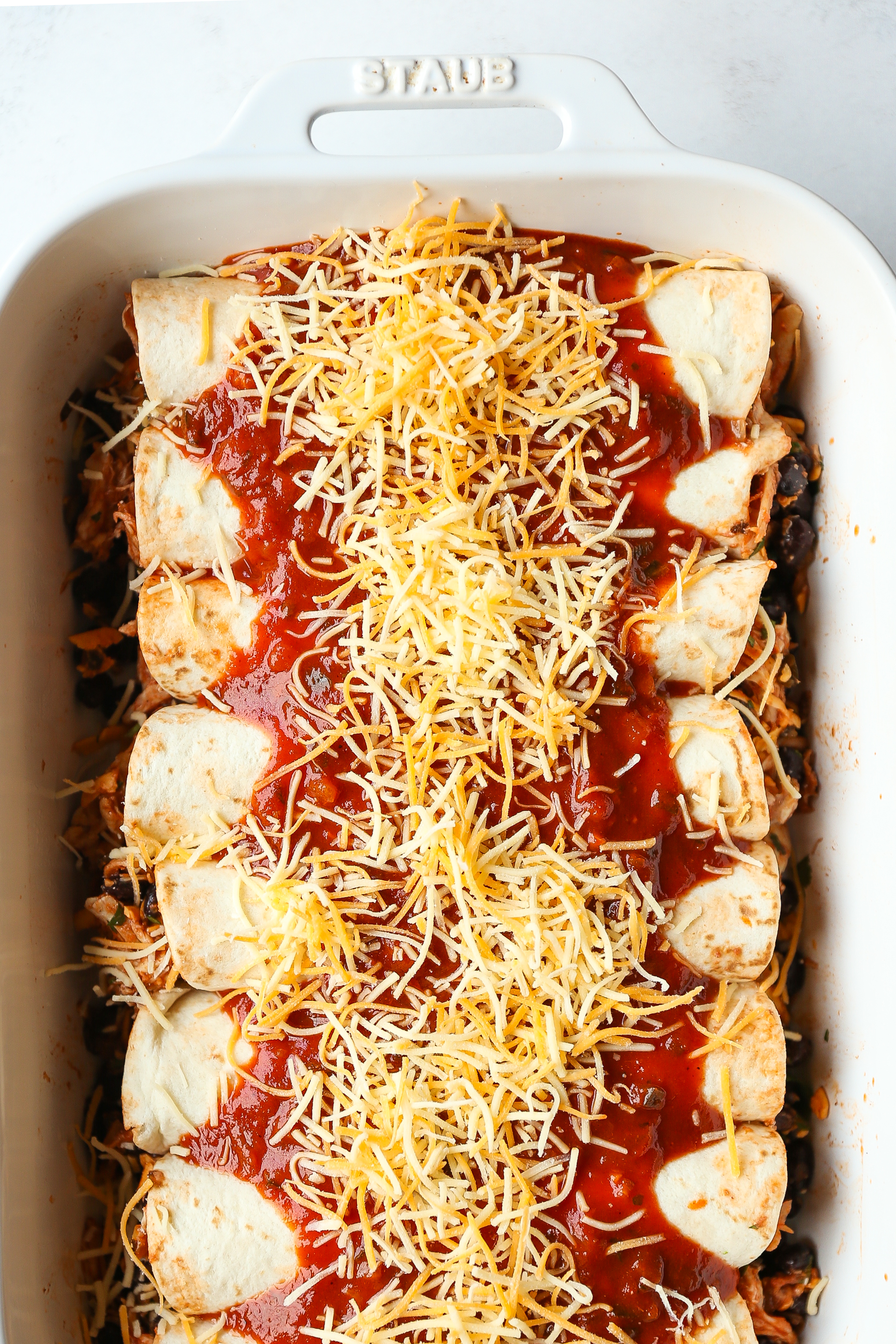 Weeknight Chicken Enchiladas - Classic chicken and black bean enchiladas! Easy to assemble with quick homemade enchilada sauce! Yes, please!