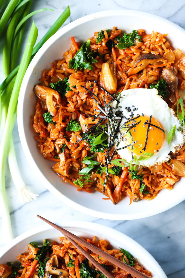 Kimchi Fried Rice - Homestyle fried rice made in just 30 min! Loaded with kimchi, mushrooms, carrots, kale and a fried egg! Sure to be a weeknight favorite!