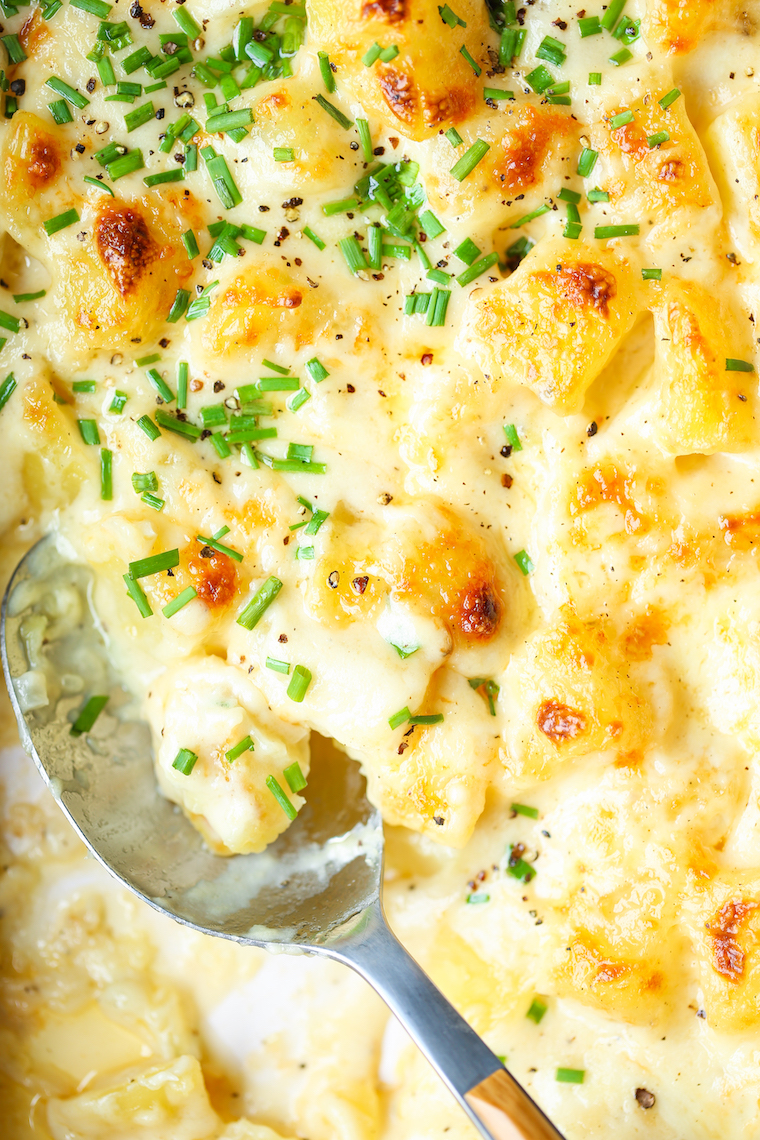 Creamy Potato Gratin - Guaranteed to be a crowd favorite side dish for dinners + holidays! So amazingly rich, creamy + buttery. Yes, please!