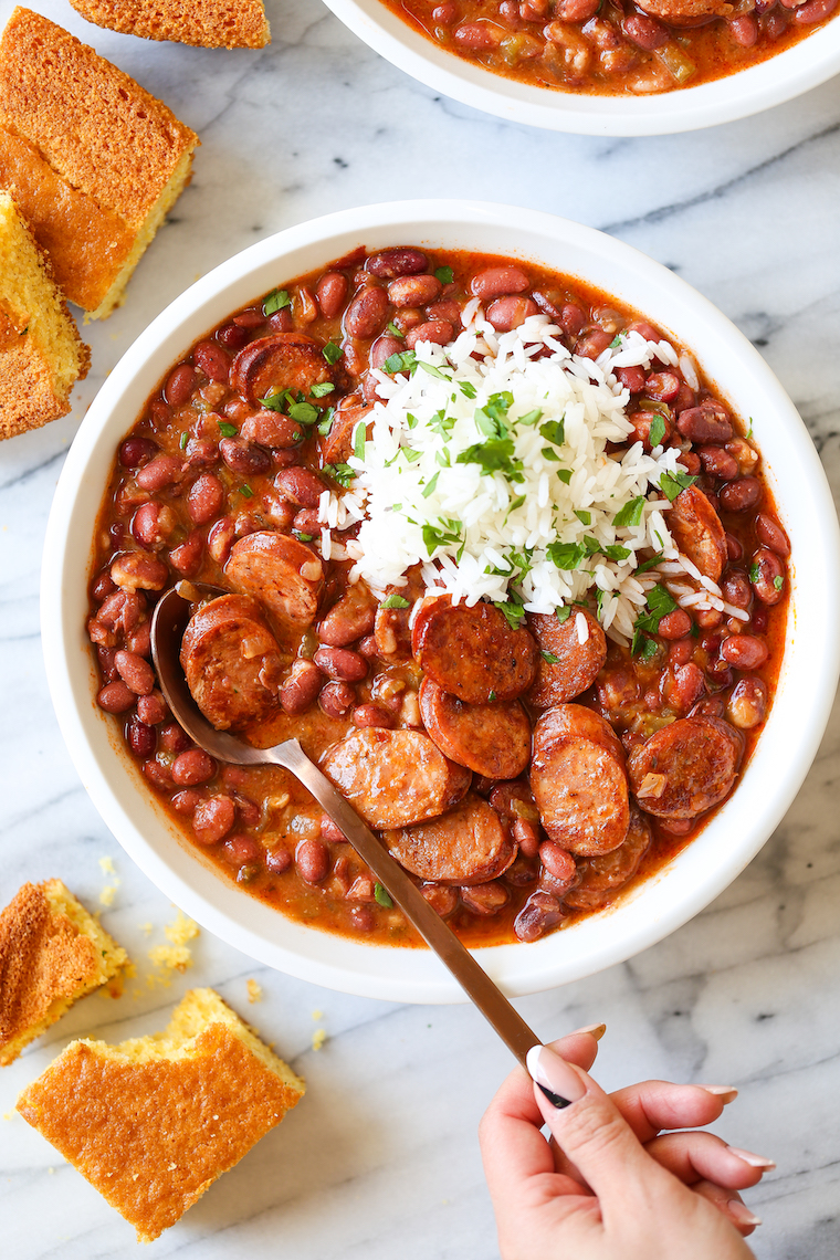 Red Beans and Rice - So thick, creamy, flavorful! Beans are cooked just right. Perfectly tender served with rice and smoky andouille sausage!