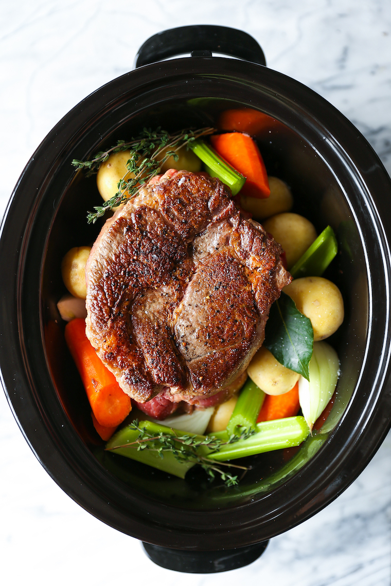 Slow Cooker Pot Roast - No-fuss, fall-apart pot roast made in your crockpot with the most tender vegetables! And the gravy is perfection.
