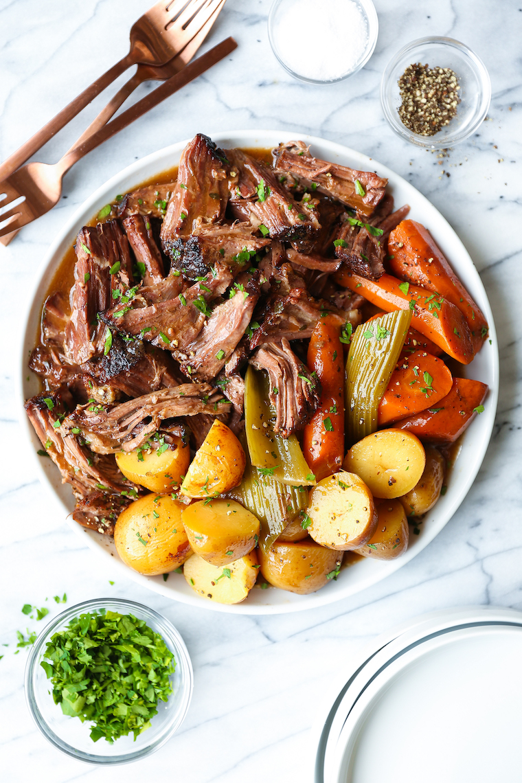 Slow Cooker Pot Roast - No-fuss, fall-apart pot roast made in your crockpot with the most tender vegetables! And the gravy is perfection.