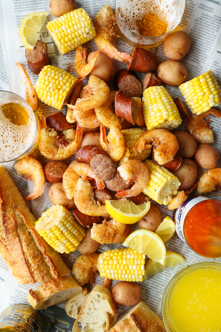 Slow Cooker Shrimp Boil - Red potatoes, andouille sausage, shrimp, corn, Old Bay. A classic shrimp boil made without any of the fuss right in your crockpot!