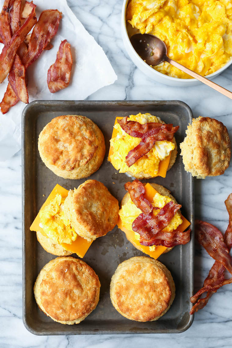 Make Ahead Breakfast Biscuit Sandwiches - Oh-so-warm, flaky buttermilk biscuits with eggs, bacon and cheese. Store in the fridge and reheat in the morning!