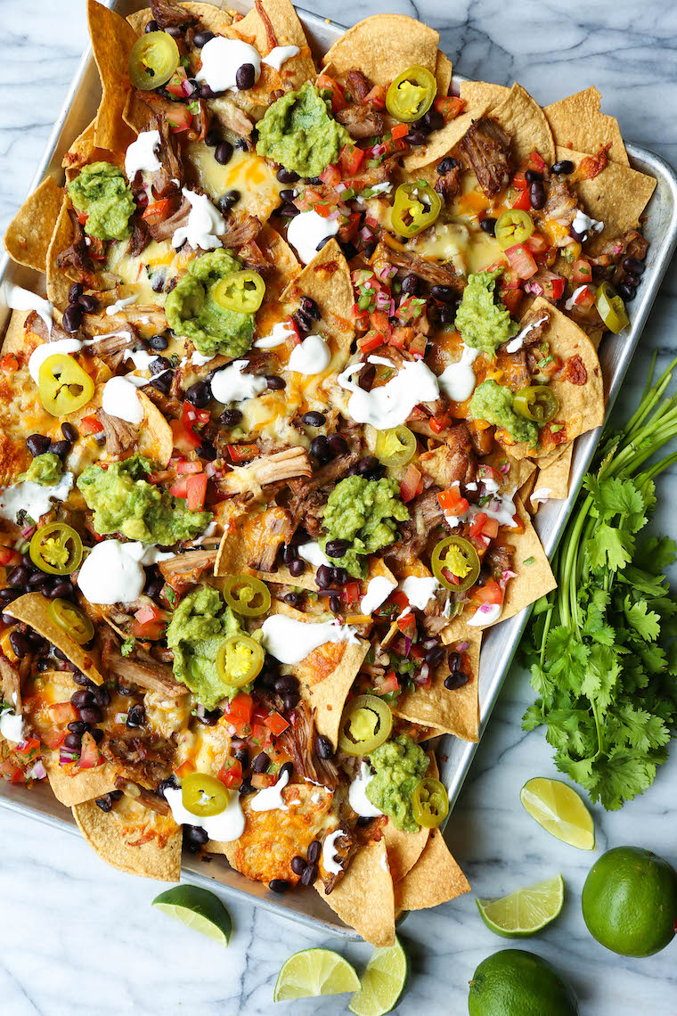 Instant Pot Pulled Pork Nachos - Crowd-pleasing, fully-loaded nachos with the most amazing melt-in-your-mouth, juicy shredded pork. So tender, so good!