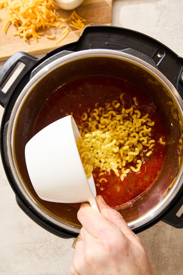 Instant Pot Cheeseburger Mac and Cheese - Homemade hamburger helper! Quick, easy, budget-friendly, and tastes SO much better than the boxed mix. A family (and childhood) favorite!
