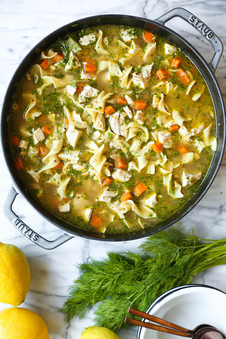 Bowl of homestyle chicken noodle soup with chicken, egg noodles, carrots, celery, and broth
