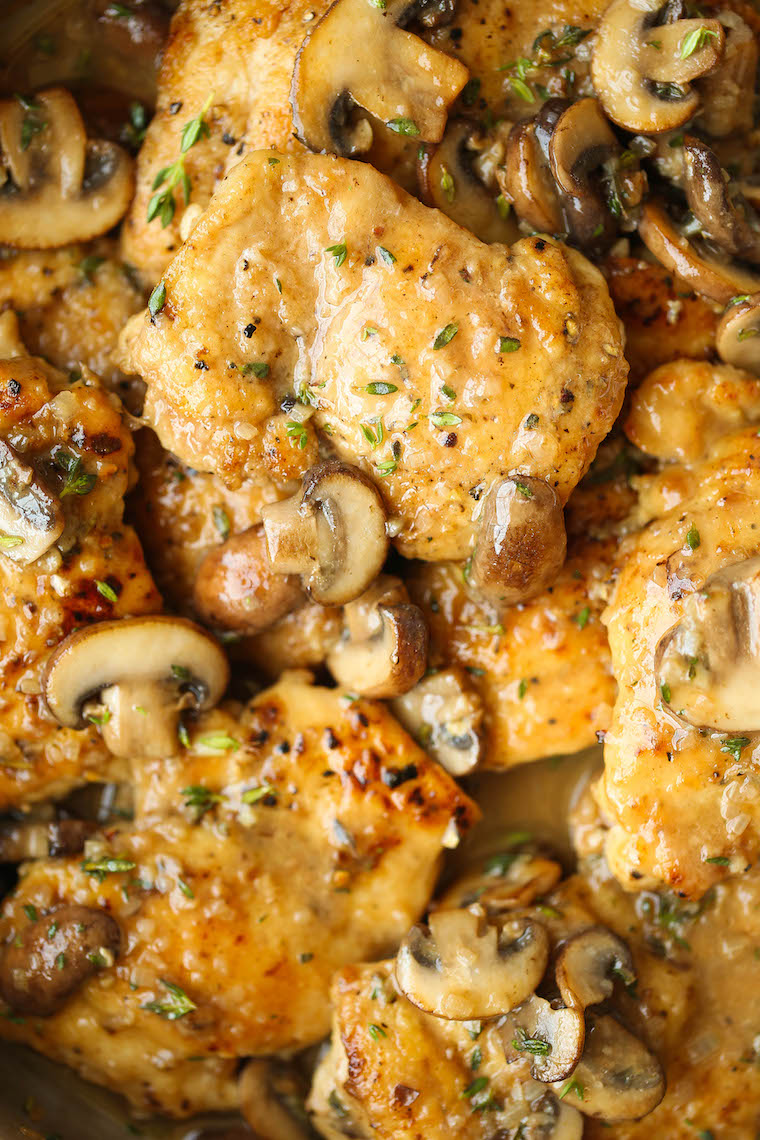 Skillet Mushroom Chicken Thighs - Golden brown, super juicy, tender chicken smothered in a garlicky, mushroom butter sauce. So quick so good!