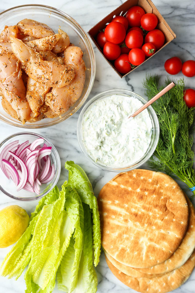 Greek Chicken Gyros - Easy, make-ahead Greek chicken gyros! Marinate the chicken overnight and serve with the best homemade tzatziki sauce!