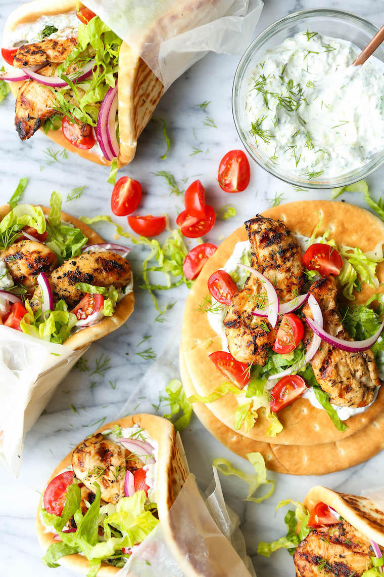 Greek Chicken Gyros - Easy, make-ahead Greek chicken gyros! Marinate the chicken overnight and serve with the best homemade tzatziki sauce!