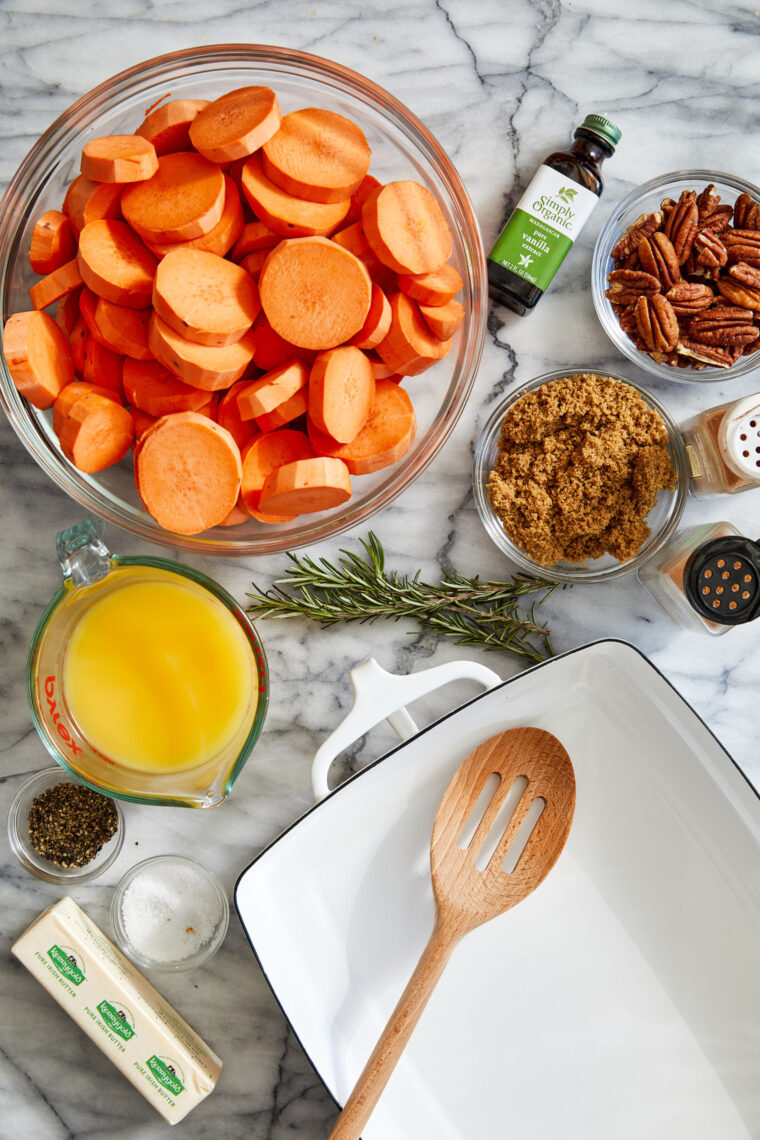 Candied Yams - How to make THE BEST homemade candied yams ever! Coated in butter, sugar, cinnamon and nutmeg. So stinking easy (and so good!).