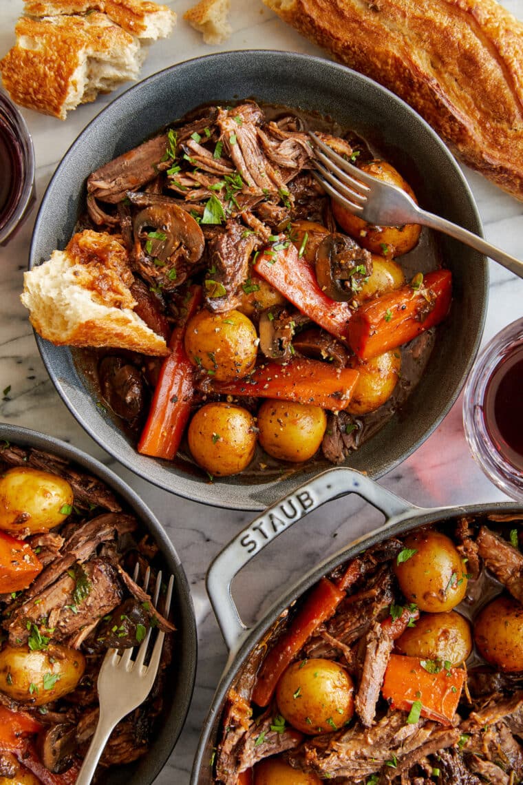 Perfect Pot Roast - Truly the best melt-in-your-mouth pot roast, cooked low and slow and simmered until perfection. Serve with crusty bread!