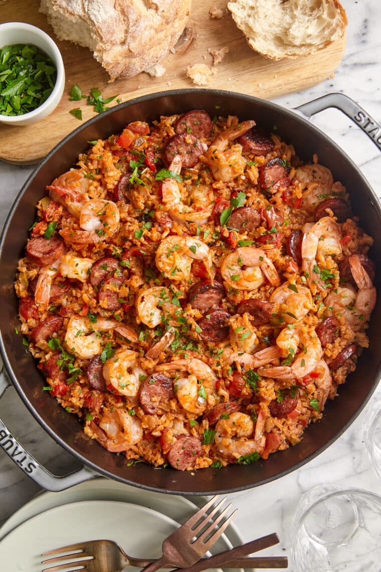 Easy jambalaya recipe with shrimp, sausage, peppers, and rice in one pot