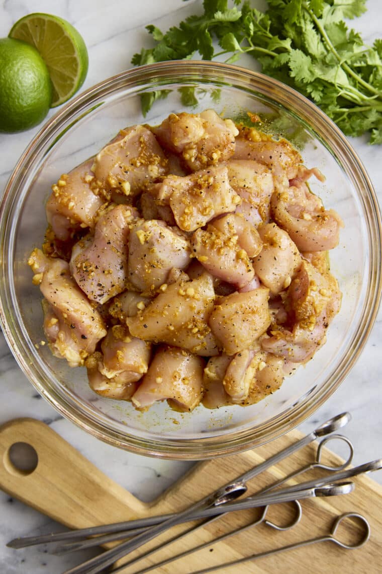 Peanut Chicken Kabobs - Moist, tender, juicy chicken! The most flavorful and easy marinade. Served with the creamiest, dreamiest peanut sauce!