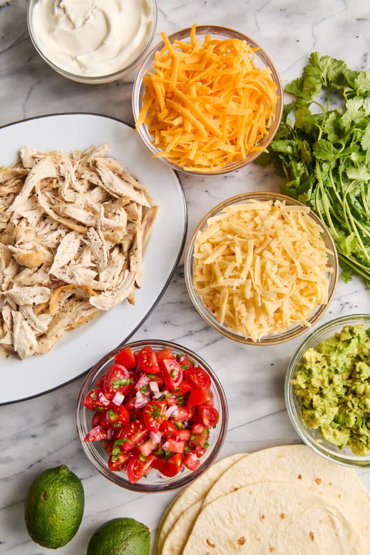 Easy Chicken Quesadillas - The best cheesy quesadillas! Golden brown crispy on the outside, perfectly melted on the inside. A 20 min recipe!