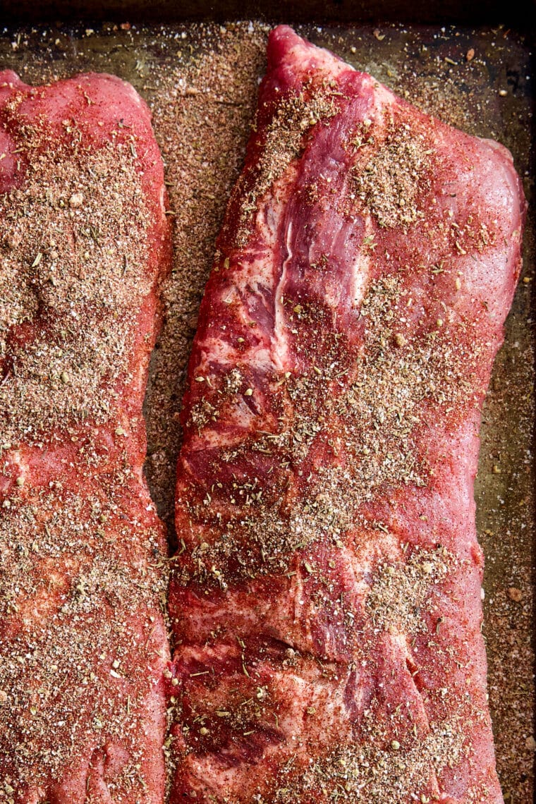 Easy Instant Pot BBQ Ribs - The easiest ribs ever made in less than 1 hr! So saucy, sticky, and tender, it just falls off-the-bone! So good.