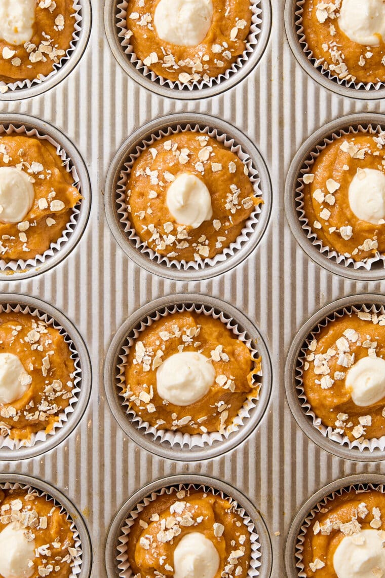 Pumpkin Cream Cheese Muffins (Starbucks Copycat) - Moist, tender pumpkin muffins with a cream cheese filling that will knock your socks off!