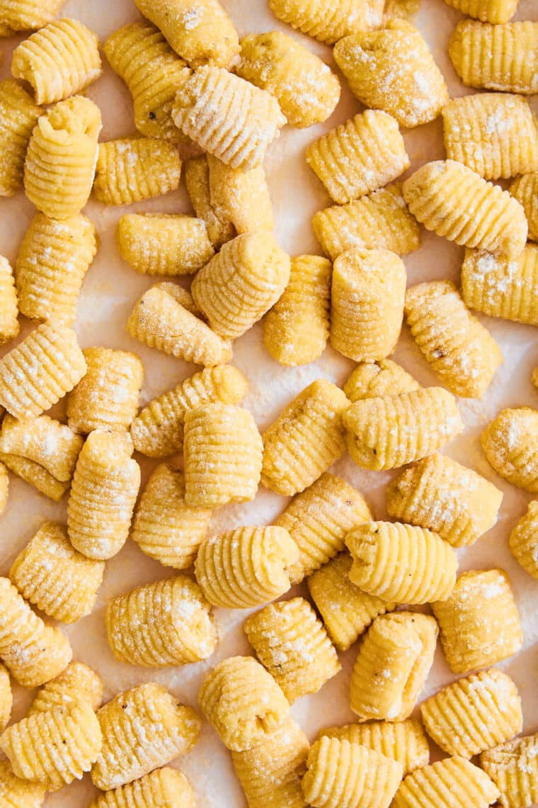 Homemade Gnocchi - Light, pillow-y, fluffy, AND SO EASY to make (just 5 ingredients!). You won't be able to go back to store-bought gnocchi!